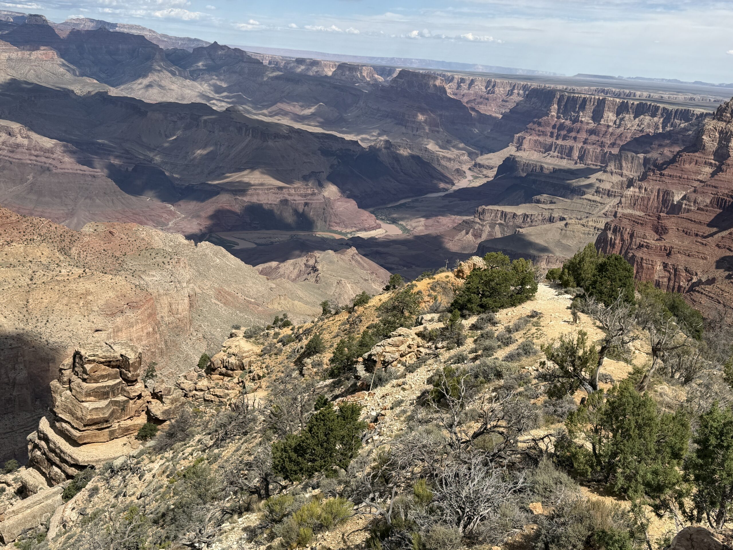 Deep view into the Grand Canyon with the Colorado River visible below.