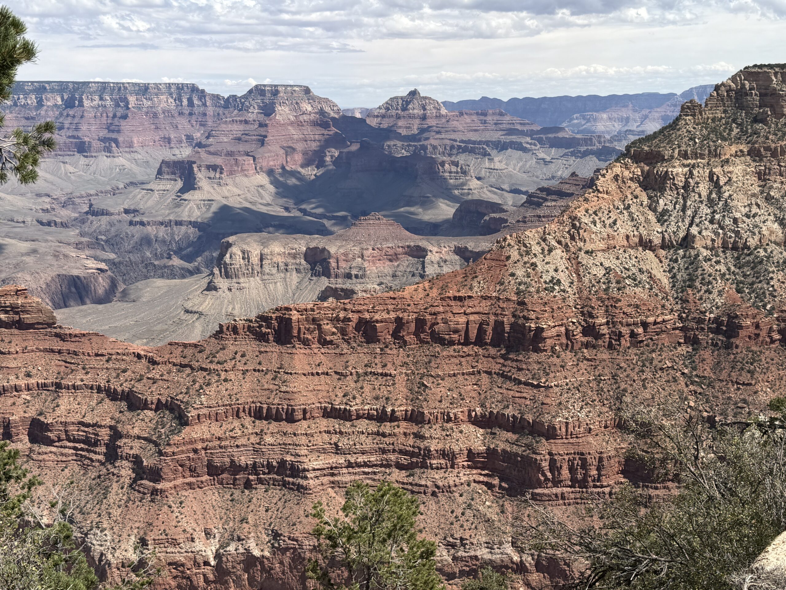 Horizontal sedimentary rock layers visible across the Grand Canyon.